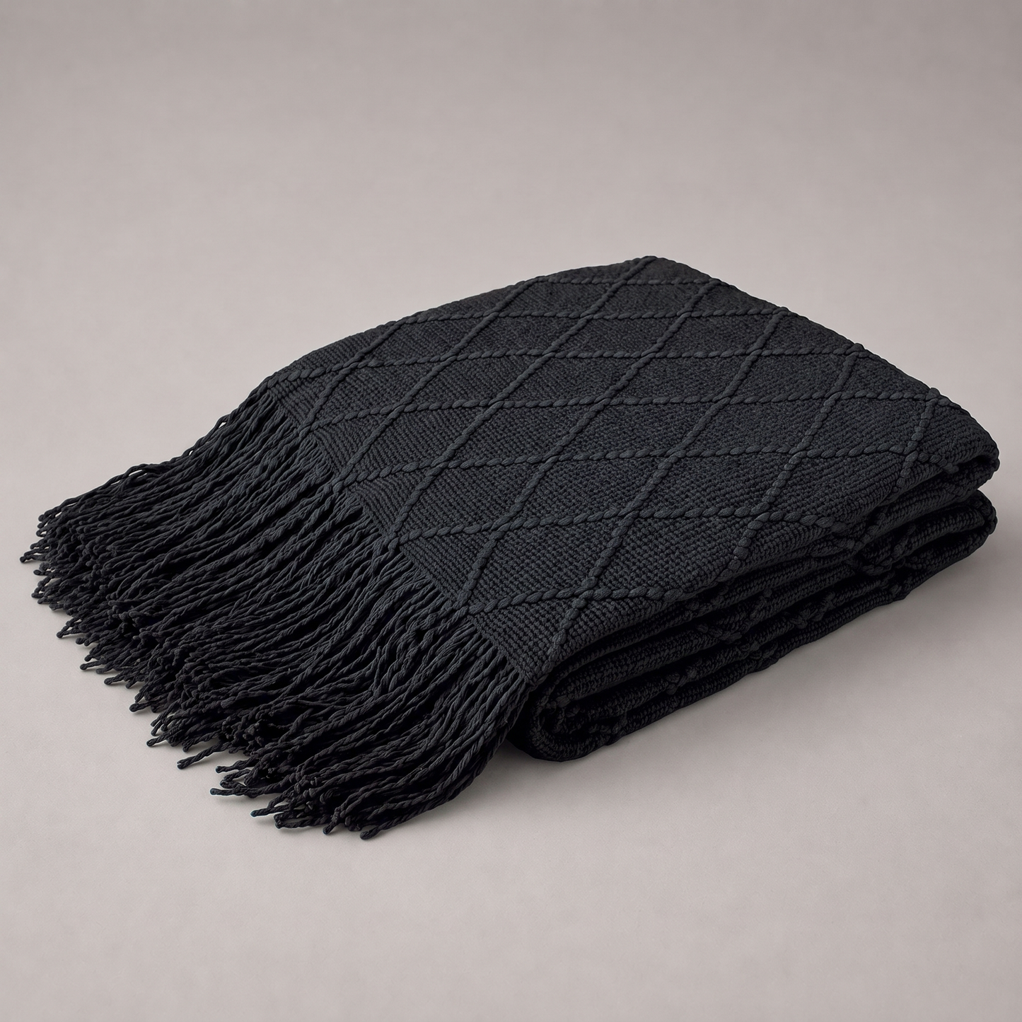 Strickdecke mit Rautenmuster